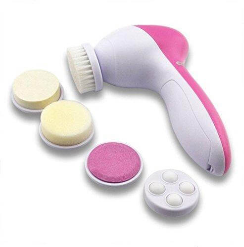 5-in-1 face and body massager pink with interchangeable cleansing and exfoliating heads.