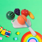 pretend fruit cutting toy set with sliceable fruits, chopping board, and safe knife for kids' imaginative play