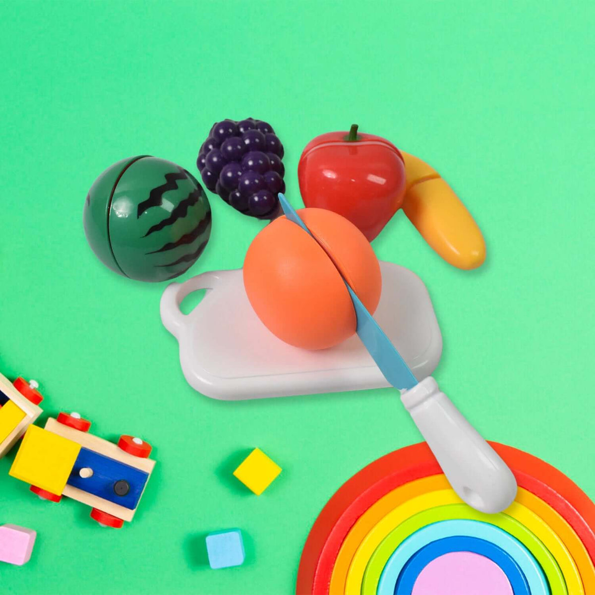 pretend fruit cutting toy set with sliceable fruits, chopping board, and safe knife for kids' imaginative play