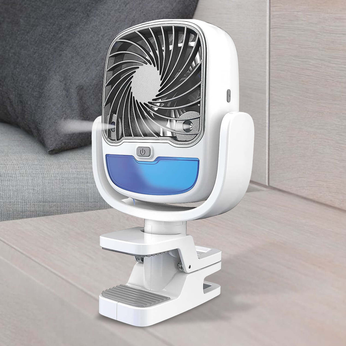 Portable clip fan with LED light showcasing 360 degree swivel design on a tabletop.