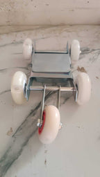 Heavy-Duty Motorcycle Front Wheel Parking Stand with smooth-gliding nylon rollers for easy maneuvering.