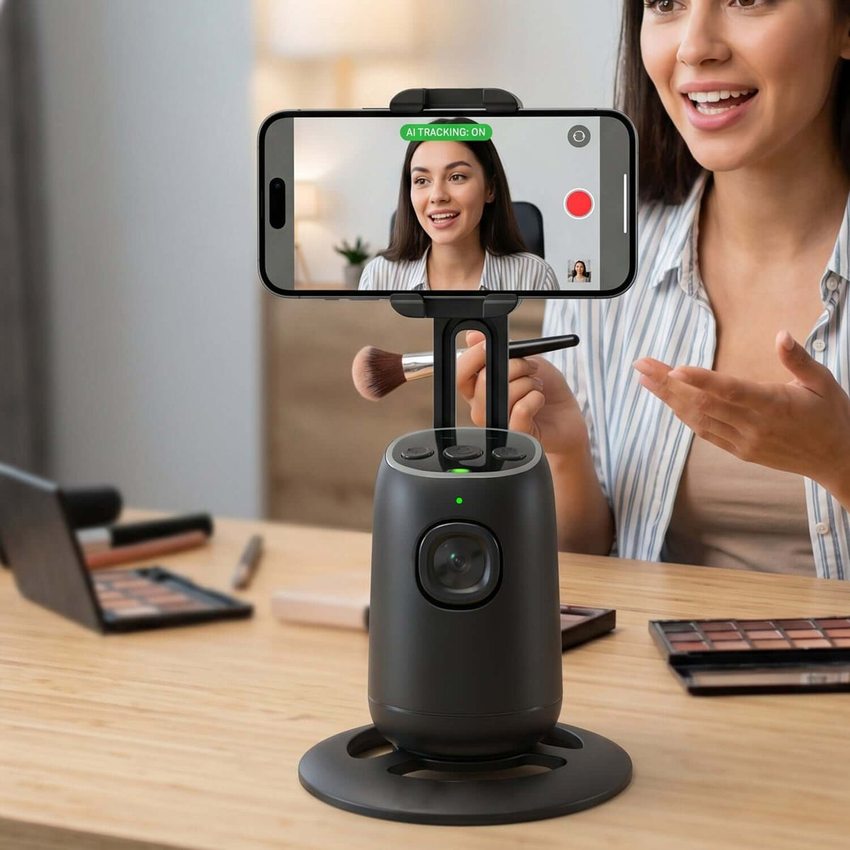 Smart AI face-tracking phone holder capturing a woman during a video call, demonstrating its 360-degree tracking capability.