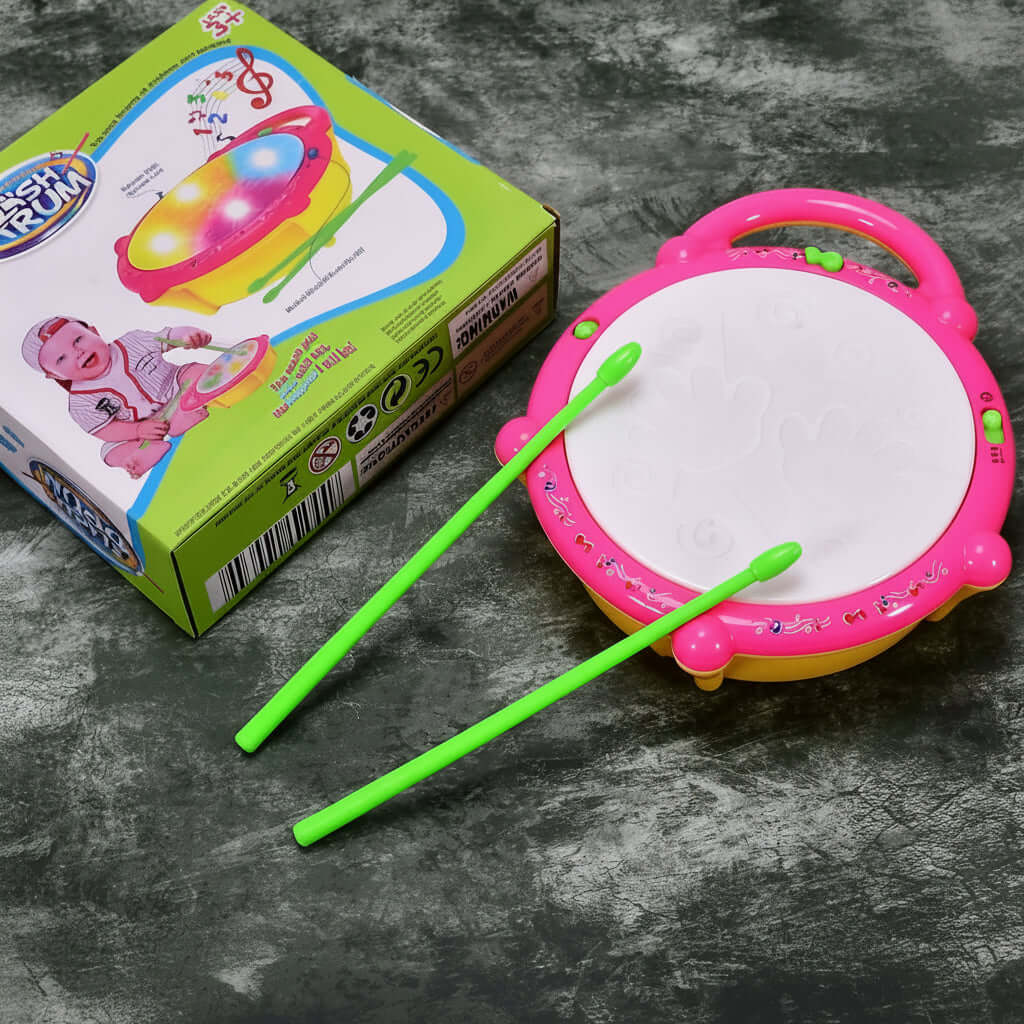 Colorful Musical Drum Toy for Kids with bright colors, lights, and two green drumsticks on a textured surface.