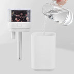 Star projector night light humidifier being filled with water for ultrasonic mist and ambiance.