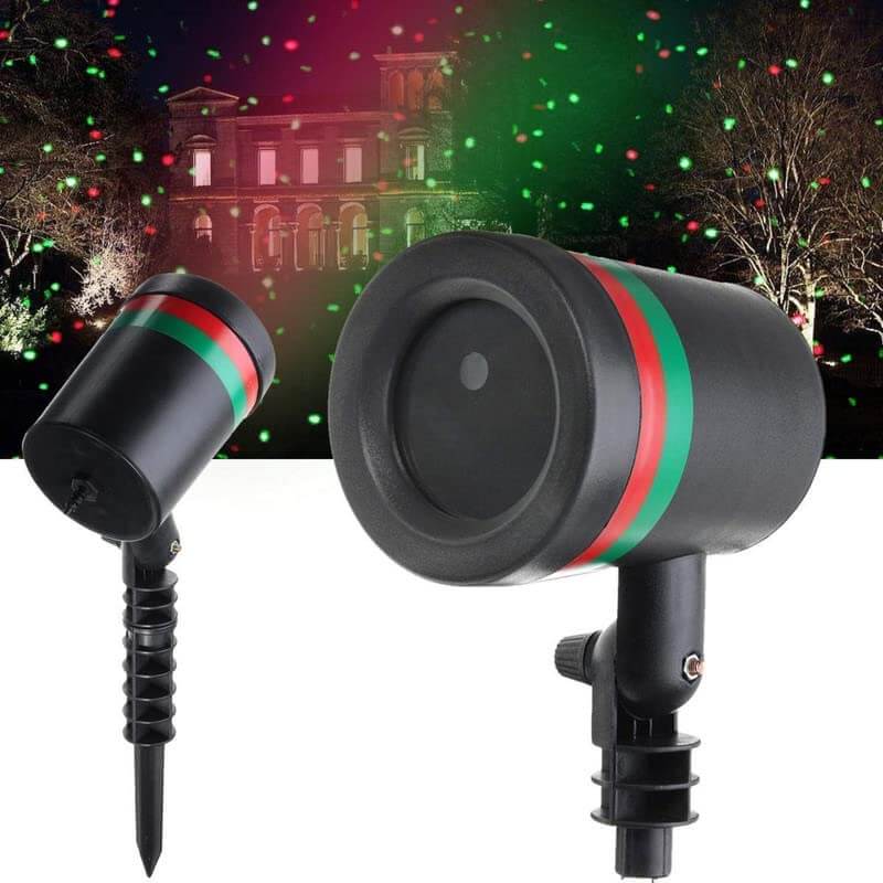 Star fairy laser light projector showcasing moving red and green dots on a house and garden, perfect for celebrations.
