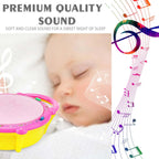 Colorful drum toy for kids beside a sleeping infant, showcasing premium quality sound for peaceful rest.