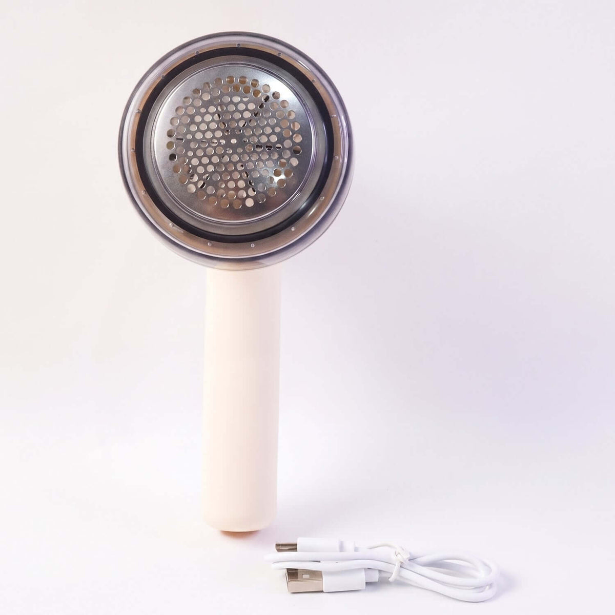 Rechargeable lint remover for clothes with stainless steel blade and USB charging cable.