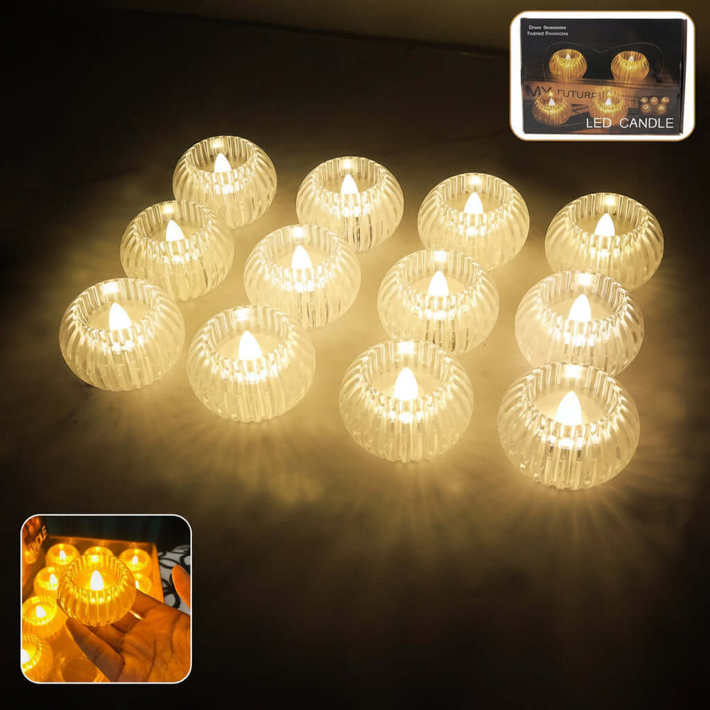 Set of 12 LED flameless tealight candles with ribbed crystal bodies illuminating a dark surface.