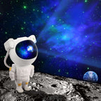 Astronaut Galaxy Projector Night Lamp with Remote illuminating a starry galaxy.