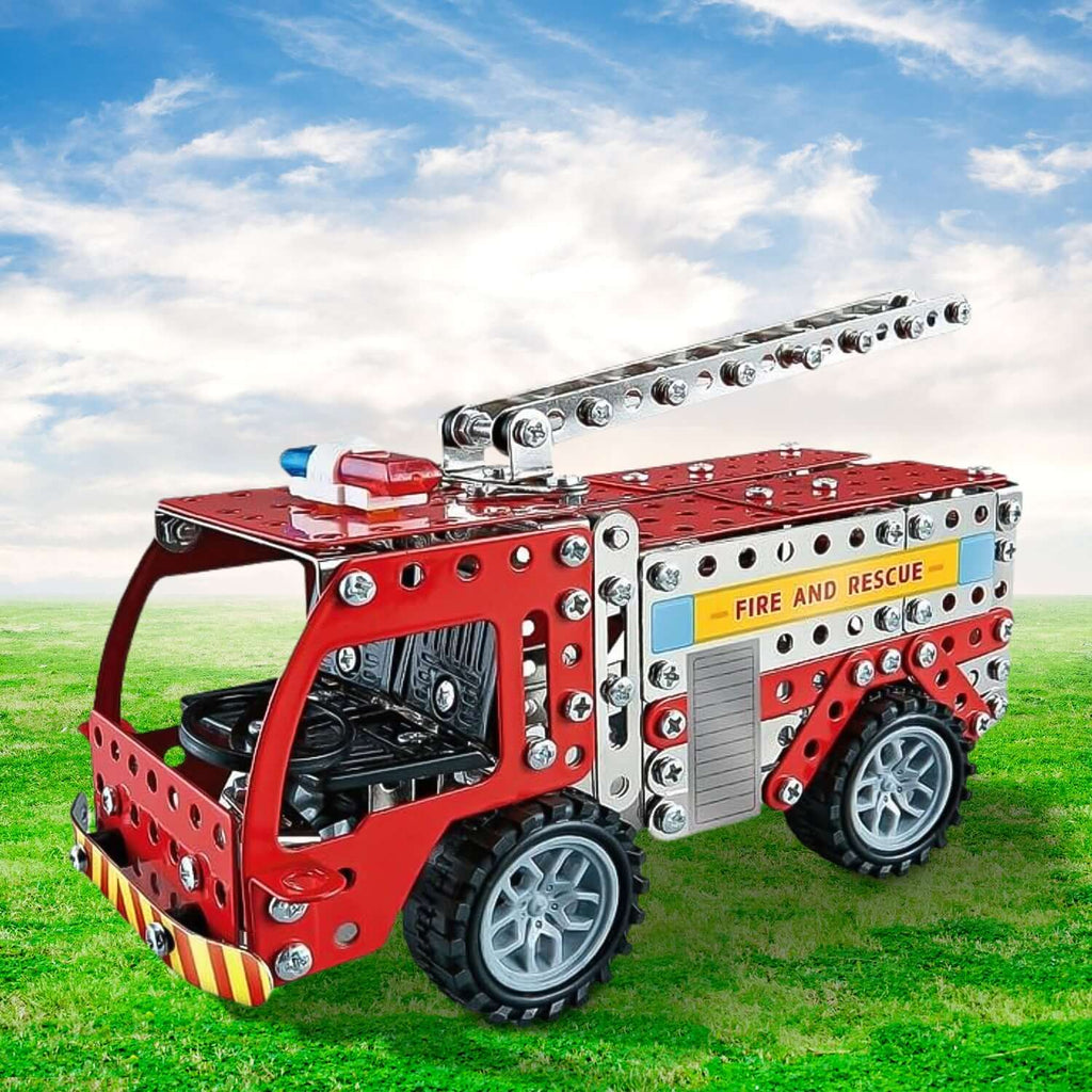 292-piece metal fire truck building blocks assembled with real nuts and bolts on green grass under blue sky.