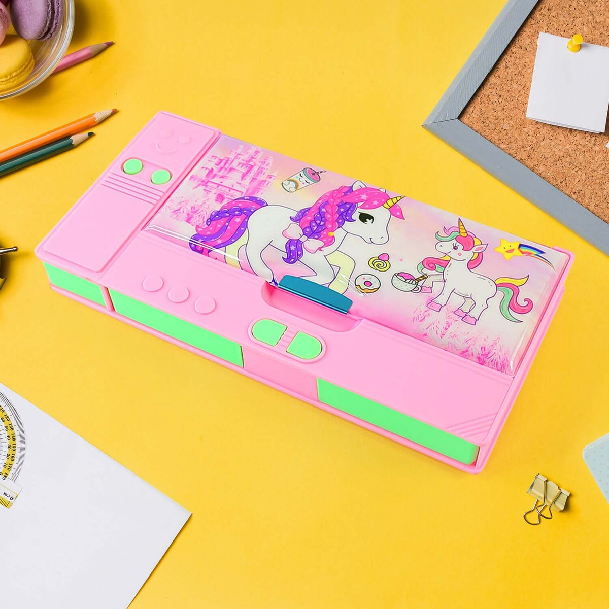 Colorful pink jumbo geometry box with calculator featuring unicorn graphics on a yellow background.