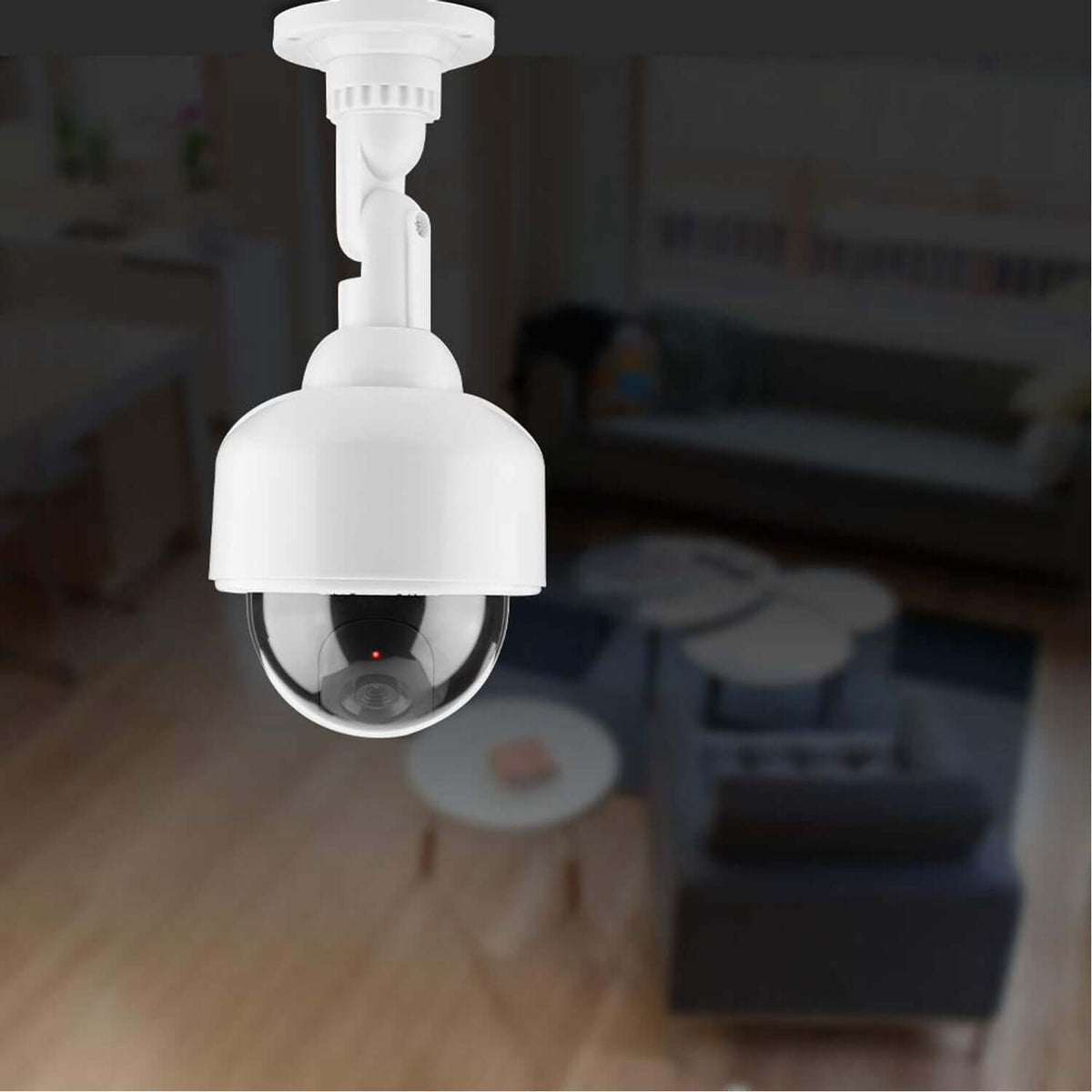 realistic dummy CCTV camera with red LED in a modern indoor setting