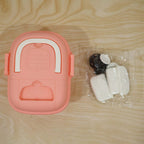 Fire Truck Toy Storage Box with Lid & Wheels (1 Pc) in pink color with accessory parts laid nearby.