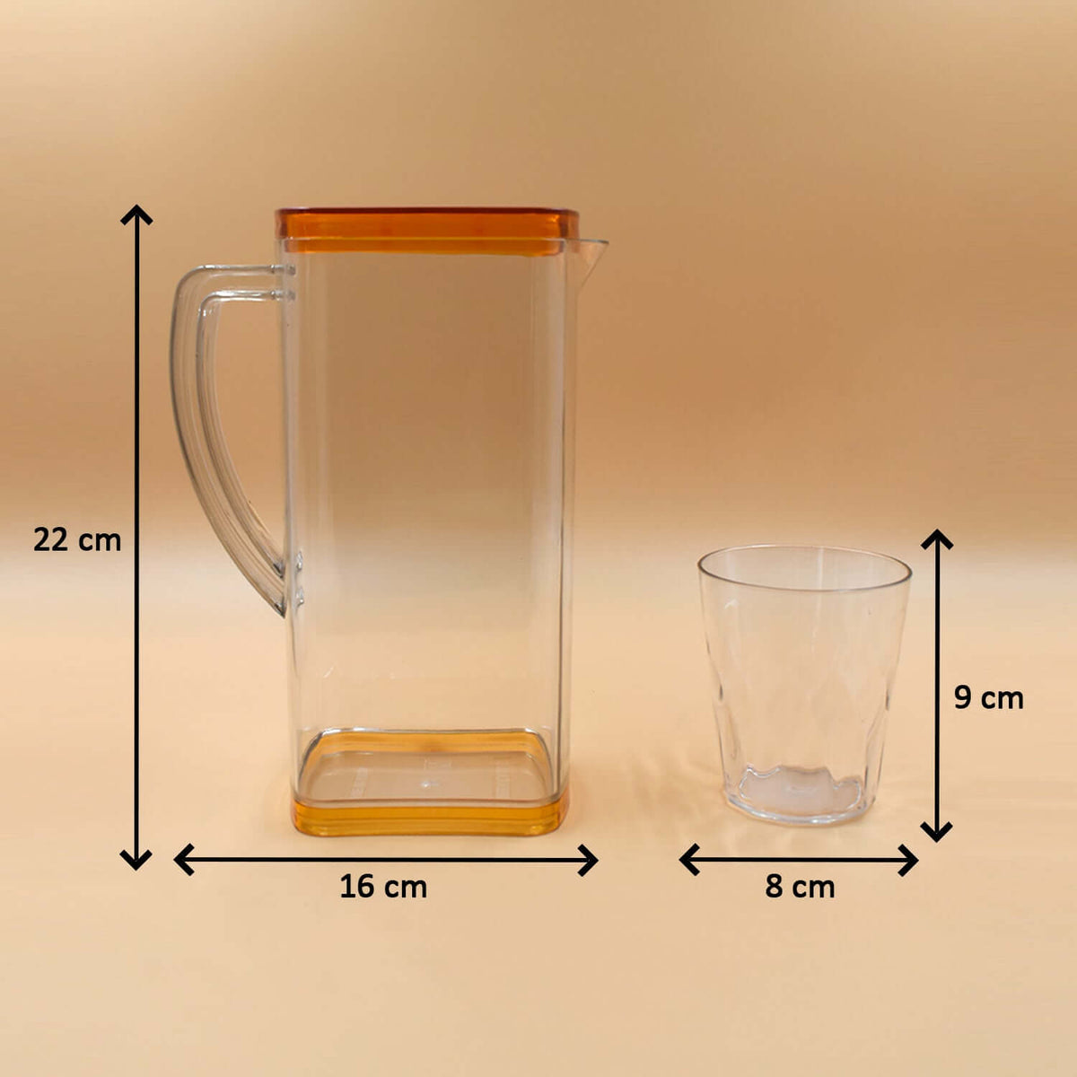 Heat-resistant glass jug set next to a matching glass, showcasing dimensions and design.