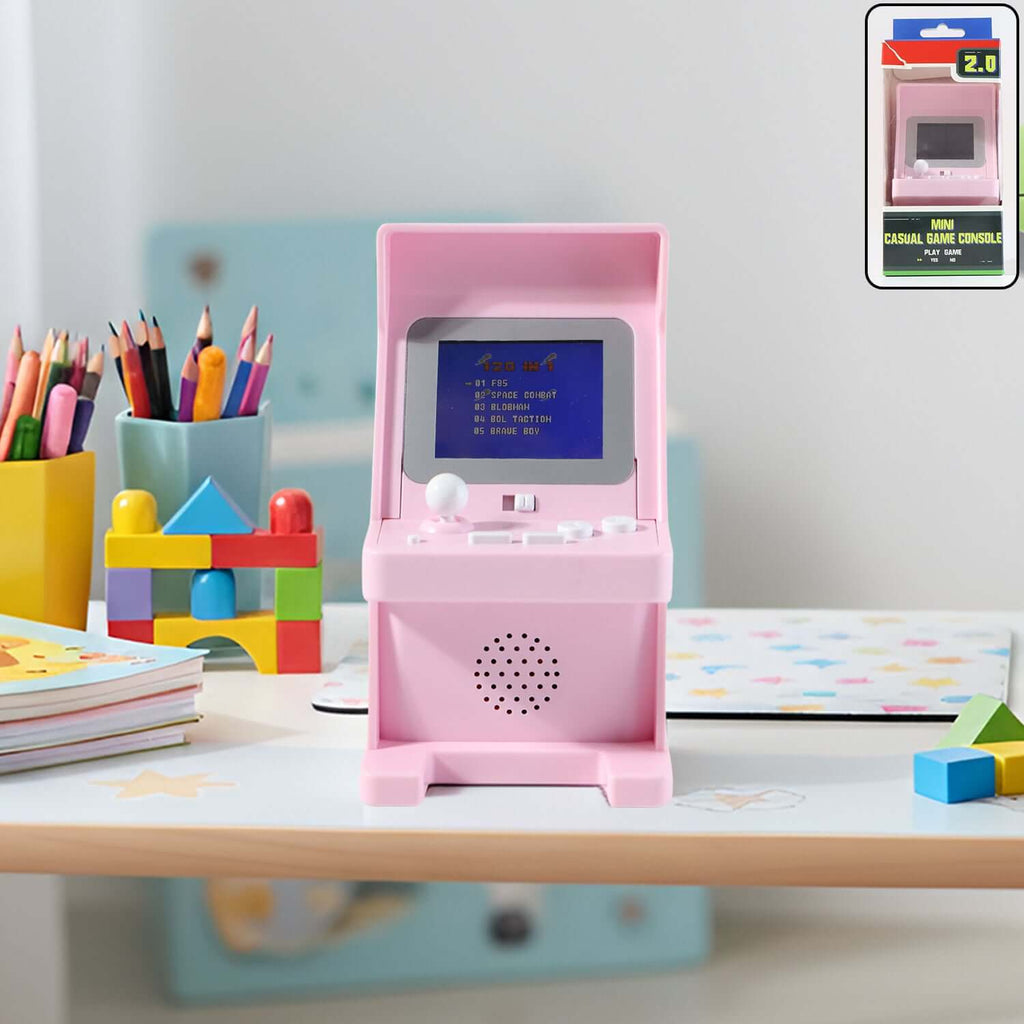 Mini Retro Arcade Gaming Console - 120 Built-in Games displayed on a colorful desk with art supplies.