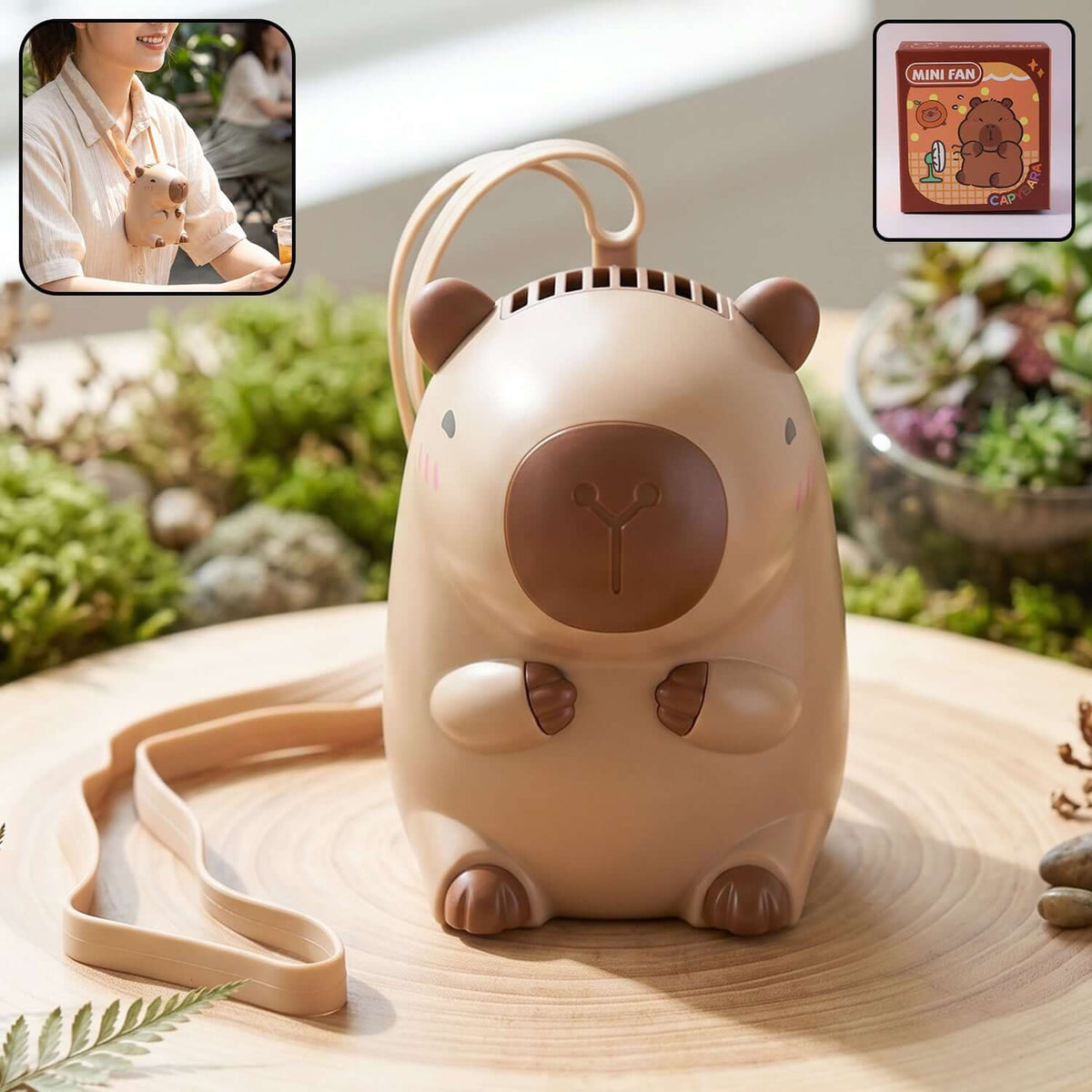 Cute bear neck fan with neck strap displayed on a wooden table in an outdoor setting.